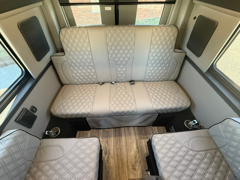  and cozy quilted seating for your next road trip.|Open refrigerator in an RV rental — photo 14