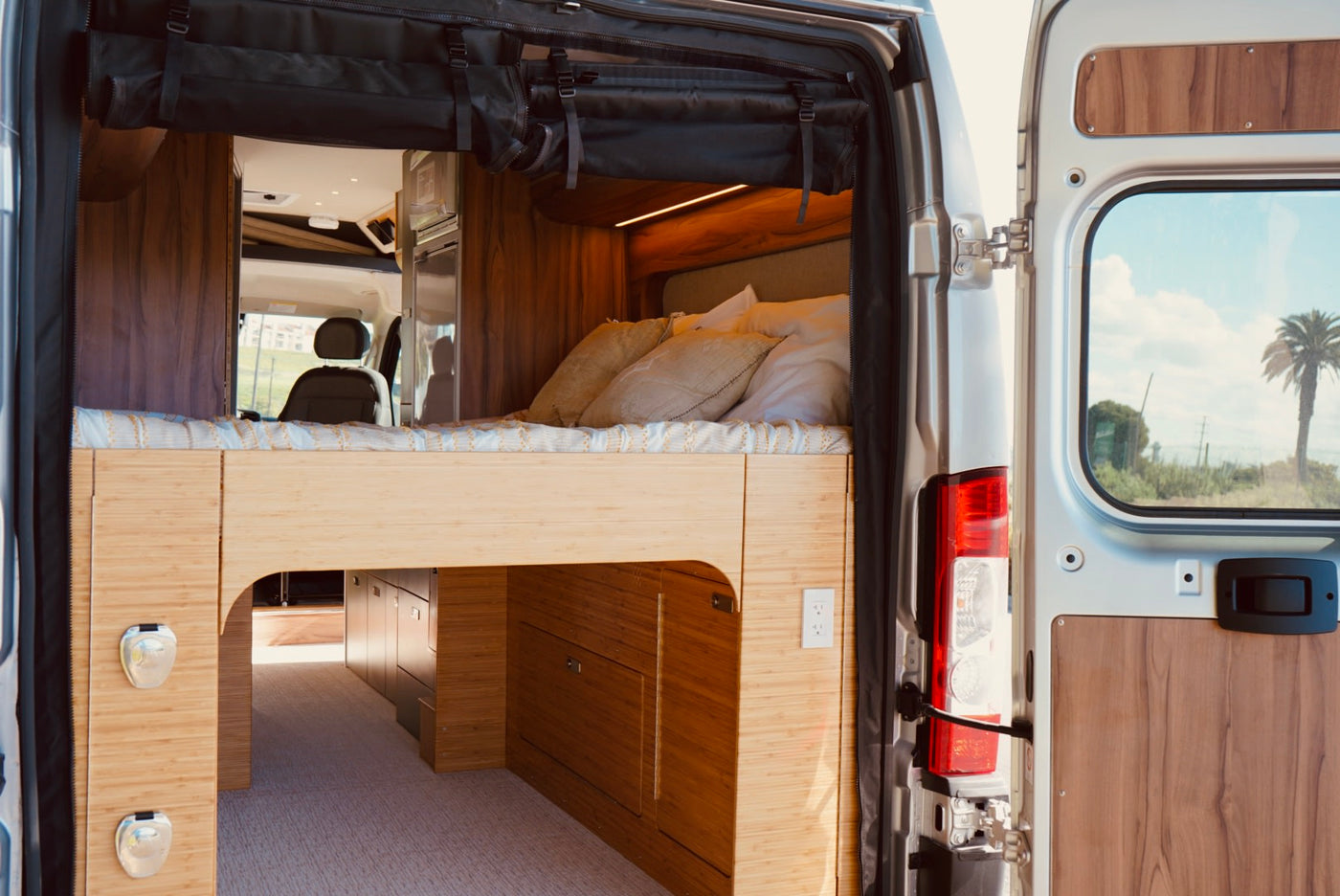  and bedroom beyond. Ready for adventure!|Cozy RV rental interior showing a compact bathroom — photo 13