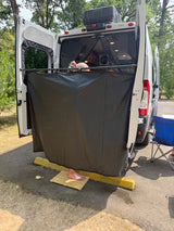A support rod between the two rear doors can hold clothes and wet suits to dry, help stabilize the doors in wind, and offer a private area for showering with a 
curtain and bamboo mat.