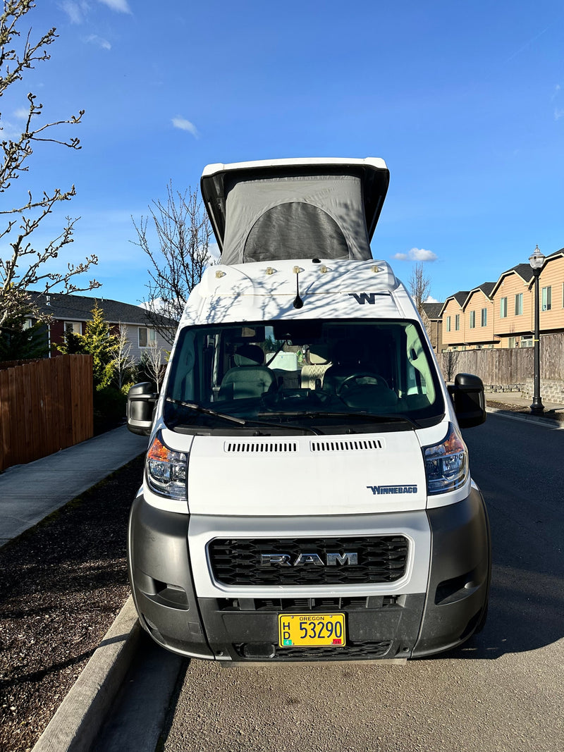  ready for adventure.|A white Winnebago Solis pop-top camper van — photo 14