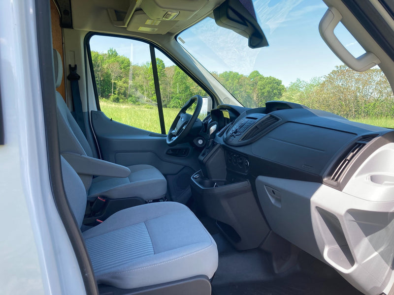  and wood interior for your adventure.|Custom RV rental van with open back doors revealing bunk beds — photo 7