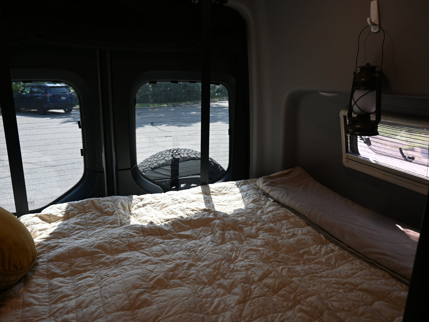  and control panel. Ideal for road trips.|This RV rental interior shows a compact kitchen with toiletries — photo 7