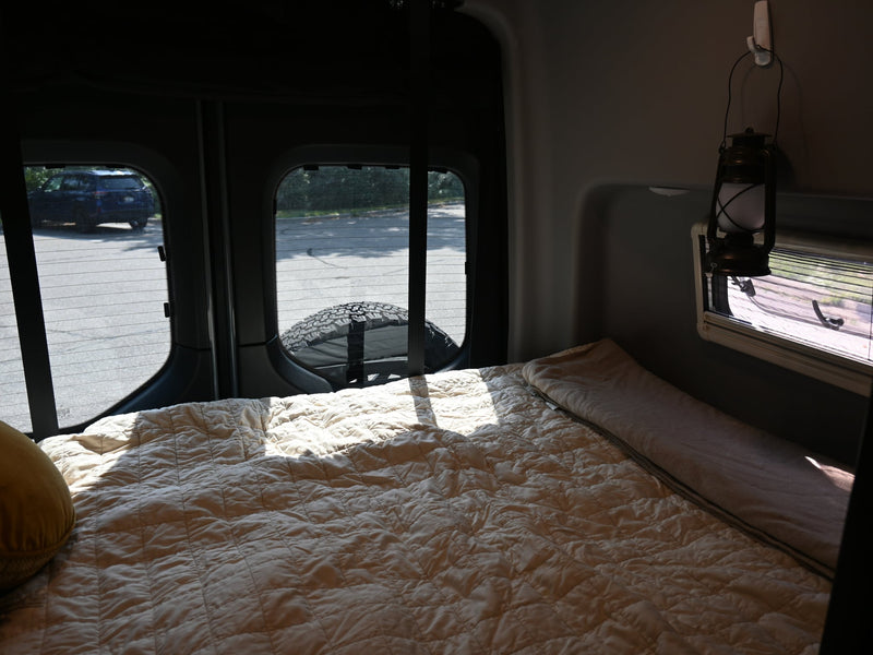  and control panel. Ideal for road trips.|This RV rental interior shows a compact kitchen with toiletries — photo 7