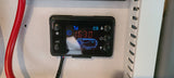 RV rental cabin heater's digital control panel showing 16:30. Essential for comfortable van life and camping.