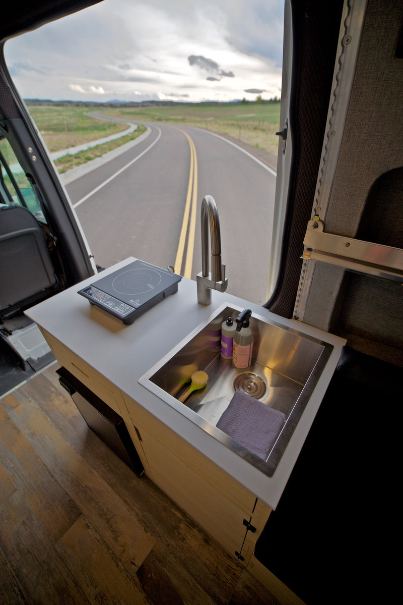  open landscape.|Experience a spacious RV rental: complete with a functional kitchen — photo 15