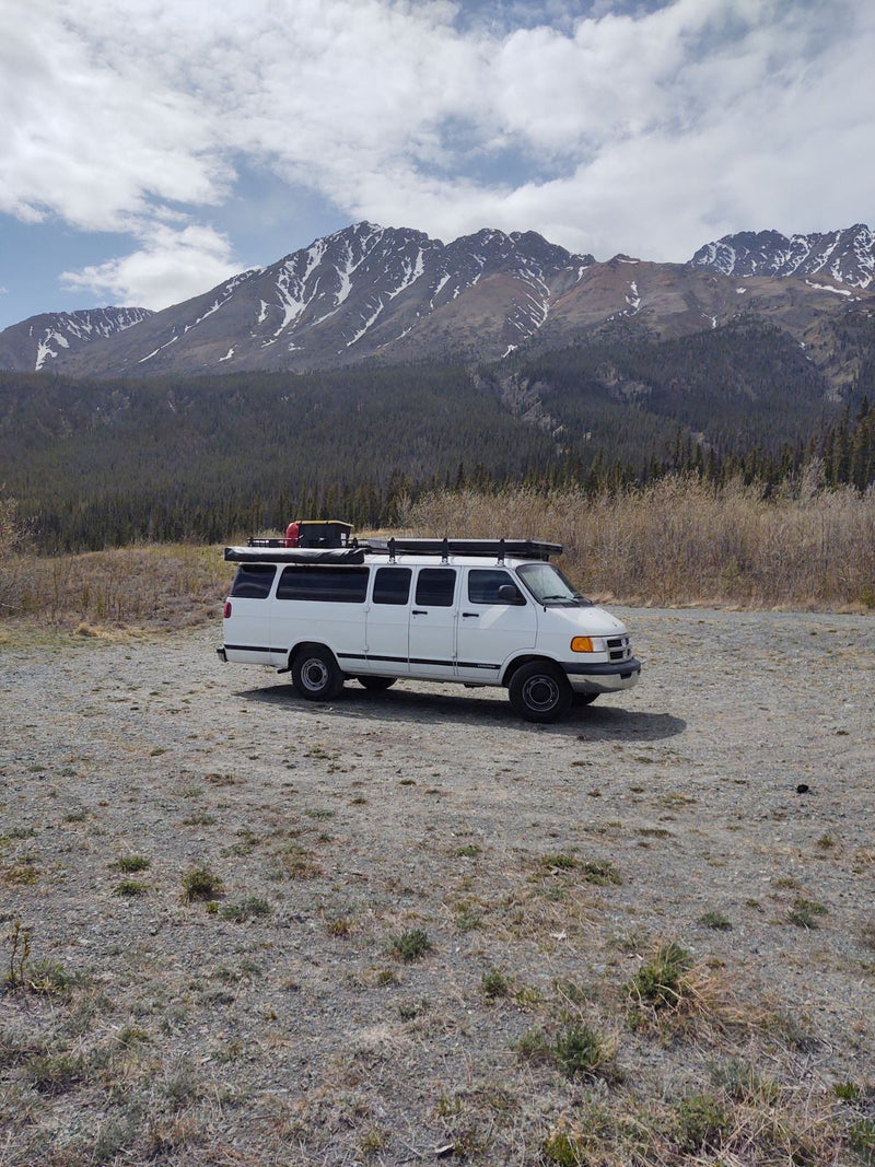  and a table. Ideal for an RV rental adventure.|Inside an RV rental: A red power inverter mounted under the seat — photo 2