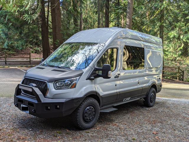 This rugged Ford Transit adventure van with off-road tires is ready for your next rv rental trip!