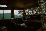 From inside a classic SUV, scenic mountain vistas unfold. Envision your next RV rental journey through stunning landscapes.