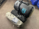 Camping gear for RV rental: Nemo portable shower and two Helinox Chair Zero chairs. Ready for adventure!