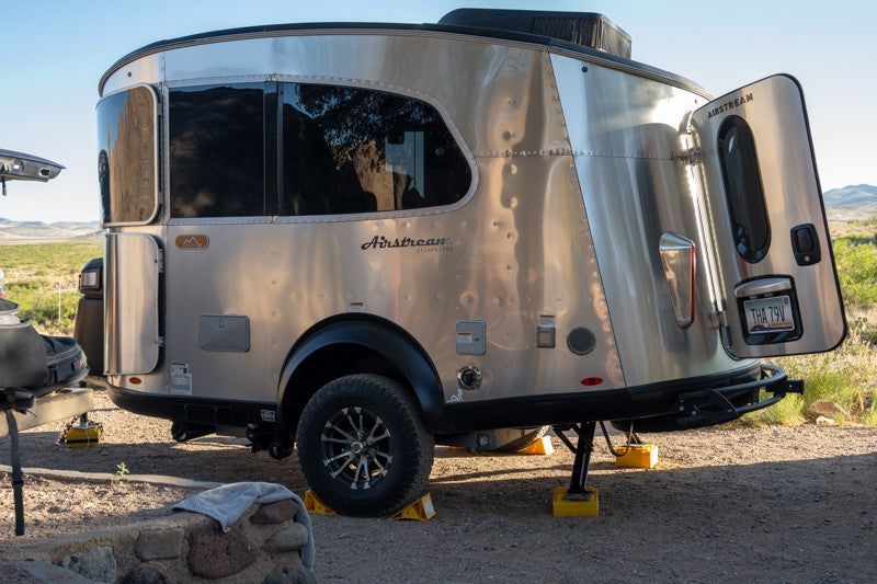 Airstream Basecamp travel trailer shows RV rental comfort at this scenic outdoor campsite. — photo 2