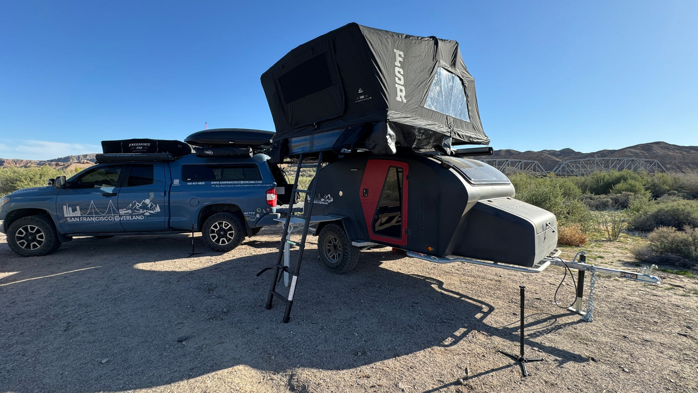 This San Francisco Overland **RV rental** features a truck, Freespirit **rooftop tent**, and Escapod **camper trailer** for **overland** adventures.