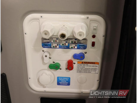 Essential RV rental water system panel for safe operation, displaying fill, sanitize, and winterizing controls.