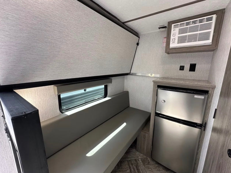  and awning. Ready for your next adventure!|RV rental interior: cozy bedroom with a new mattress — photo 6