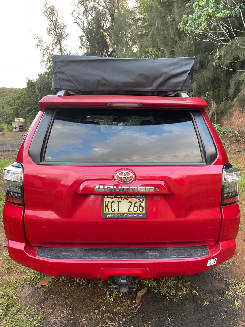 Red Toyota 4Runner SUV with a rooftop tent, ideal for Hawaii rv rental adventures. Perfect for camping & overlanding. — photo 2