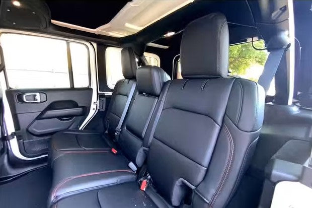  and central console controls. Ideal for an rv rental.|Jeep vehicle interior: dashboard controls