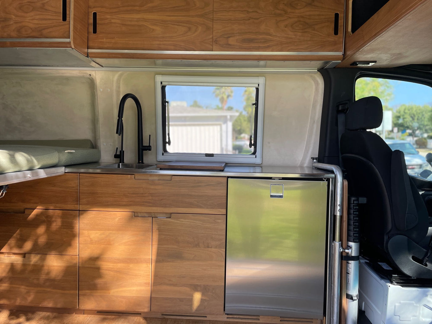  viewed from inside an RV rental. Ocean waves and colorful sky.|Nighttime view from an RV rental — photo 3