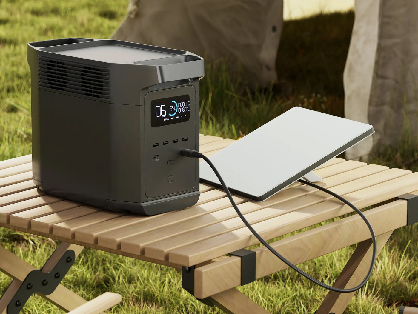  featuring a pop-top tent and open mobile kitchen.|Convenient outdoor power for your RV rental: portable power station charging a tablet on a wooden camping table.|Compact RV rental interior featuring a wood dinette