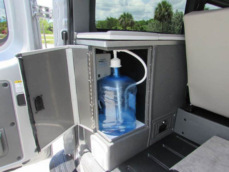  ideal for your next RV rental adventure.|Roadtrek N-6 Active RV rental: a customized silver Nissan NV van with off-road tires