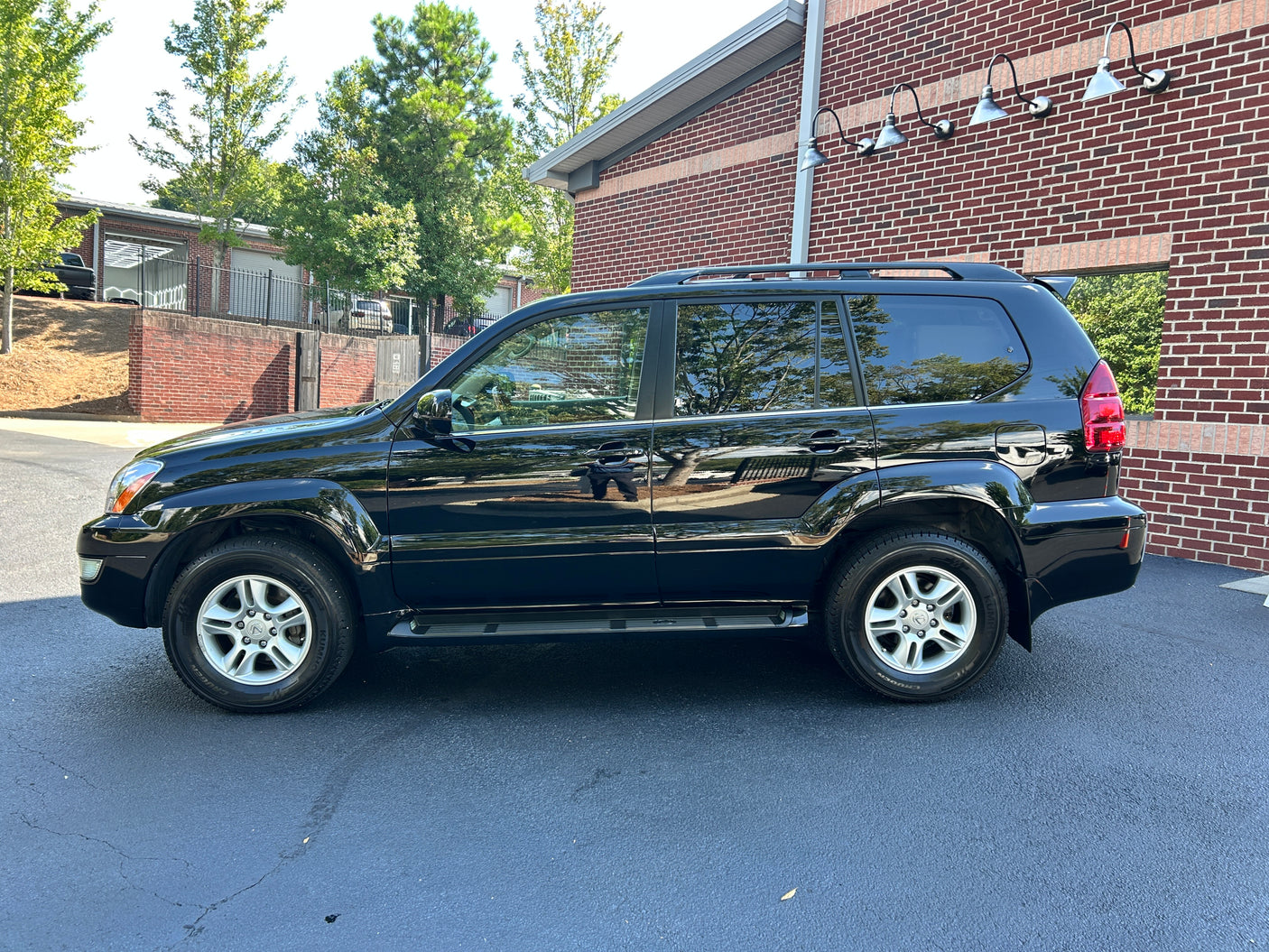 Black SUV. Ideal for travel; inquire about SUV & RV rental availability.