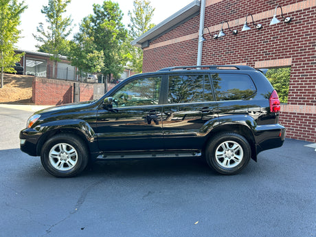 Black SUV. Ideal for travel; inquire about SUV & RV rental availability.