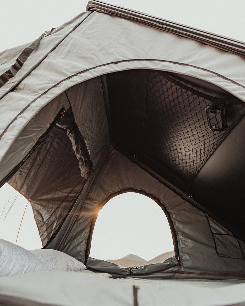 Awaken to mountain views from a comfortable rooftop tent. Perfect for your RV rental adventure! — photo 16