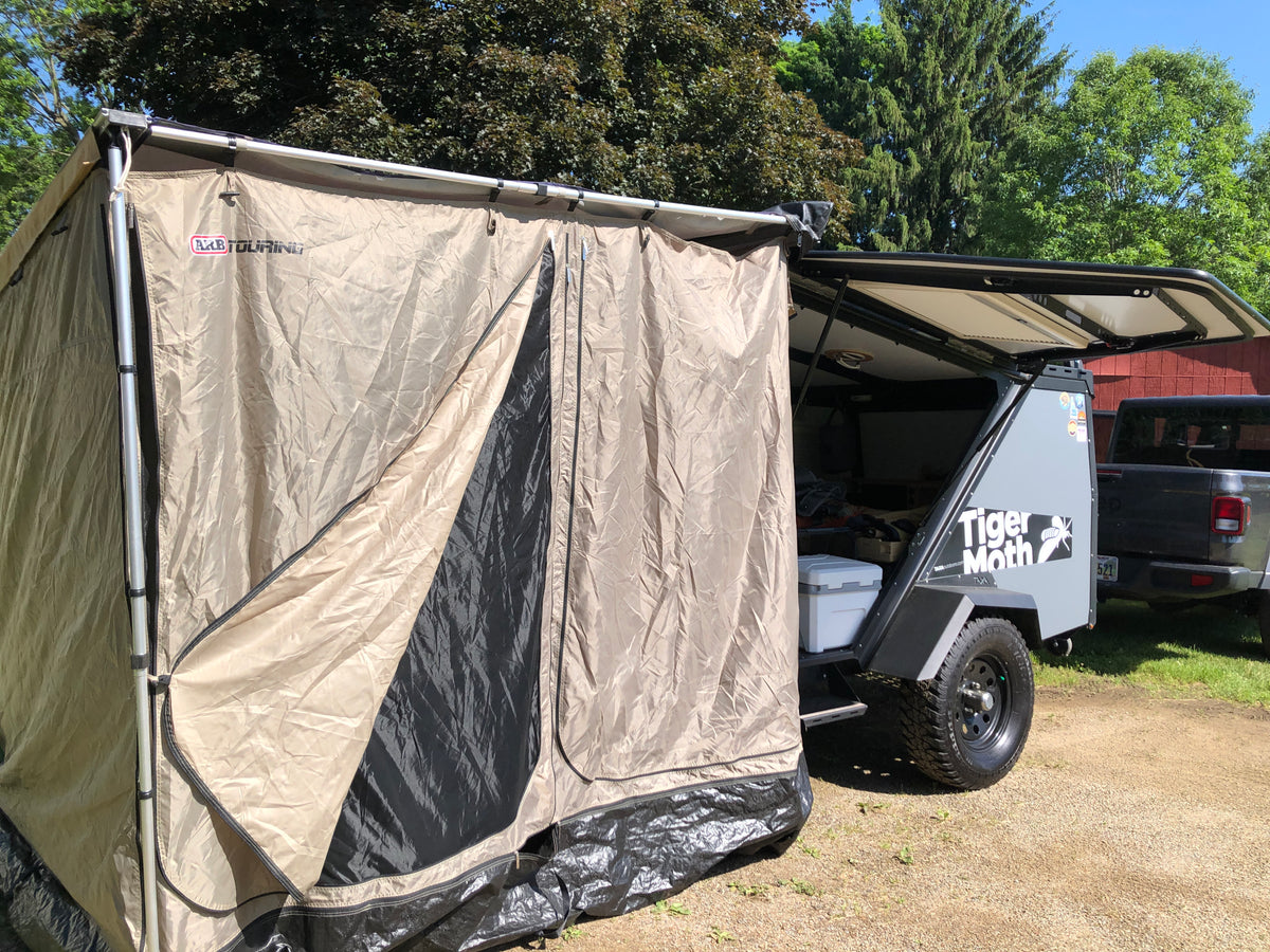 Spacious ARB Touring tent attached to a Tiger Moth camper trailer, great for RV rental outdoor experiences. — photo 7
