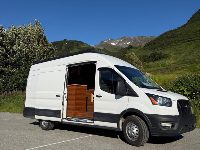 White campervan RV rental with open door