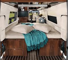  and privacy blinds. Ready for adventure!|Inside a stylish rv rental: a compact kitchen with sink — photo 6