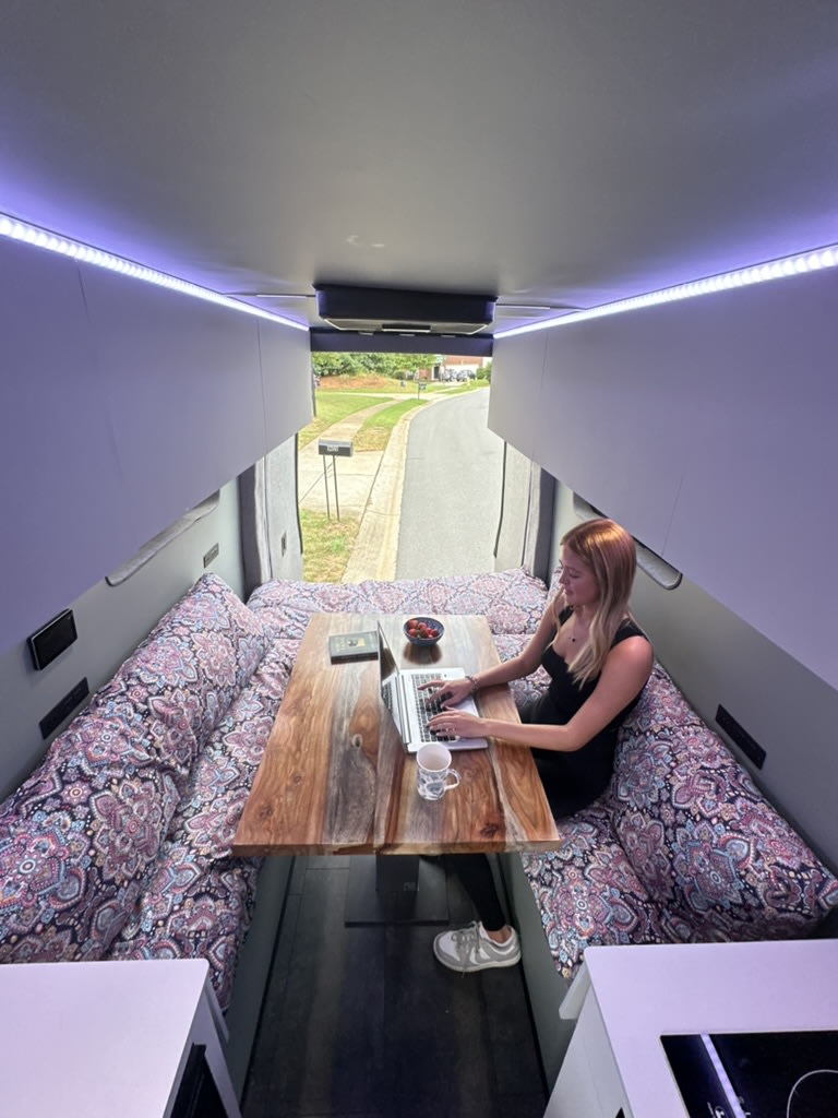  and bright LED strip lighting. Ideal for road trips.|Compact RV rental kitchen with sink — photo 4