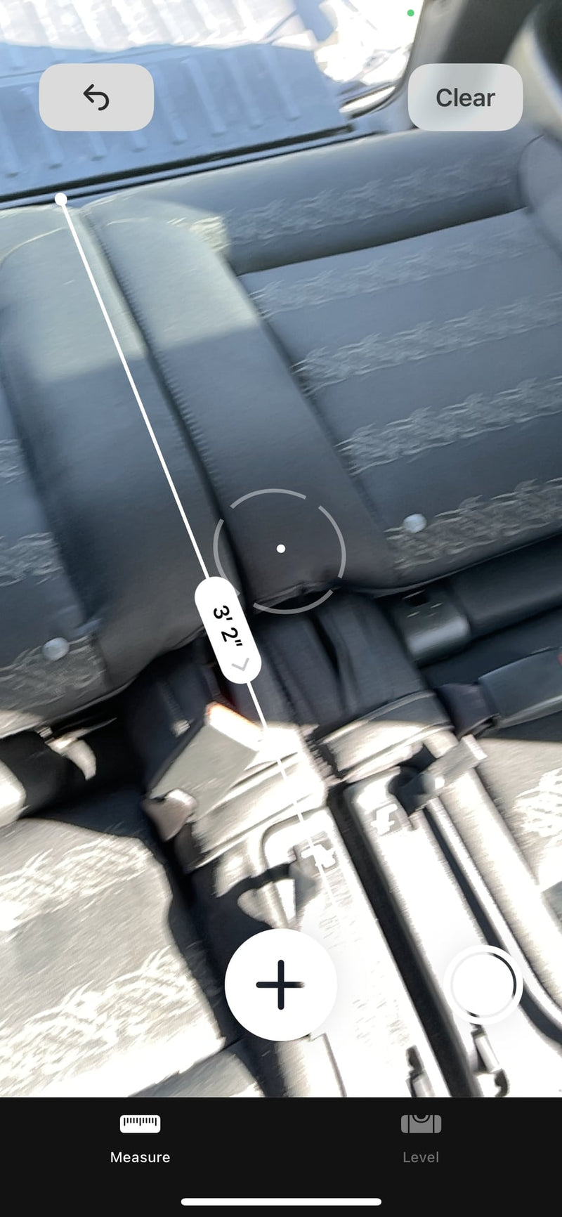  featuring patterned fabric upholstery.|RV rental rear seating features: dark patterned seats — photo 14