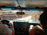 Inside a Jeep on a rugged, rocky trail. Enjoying an off-road adventure during an rv rental trip.