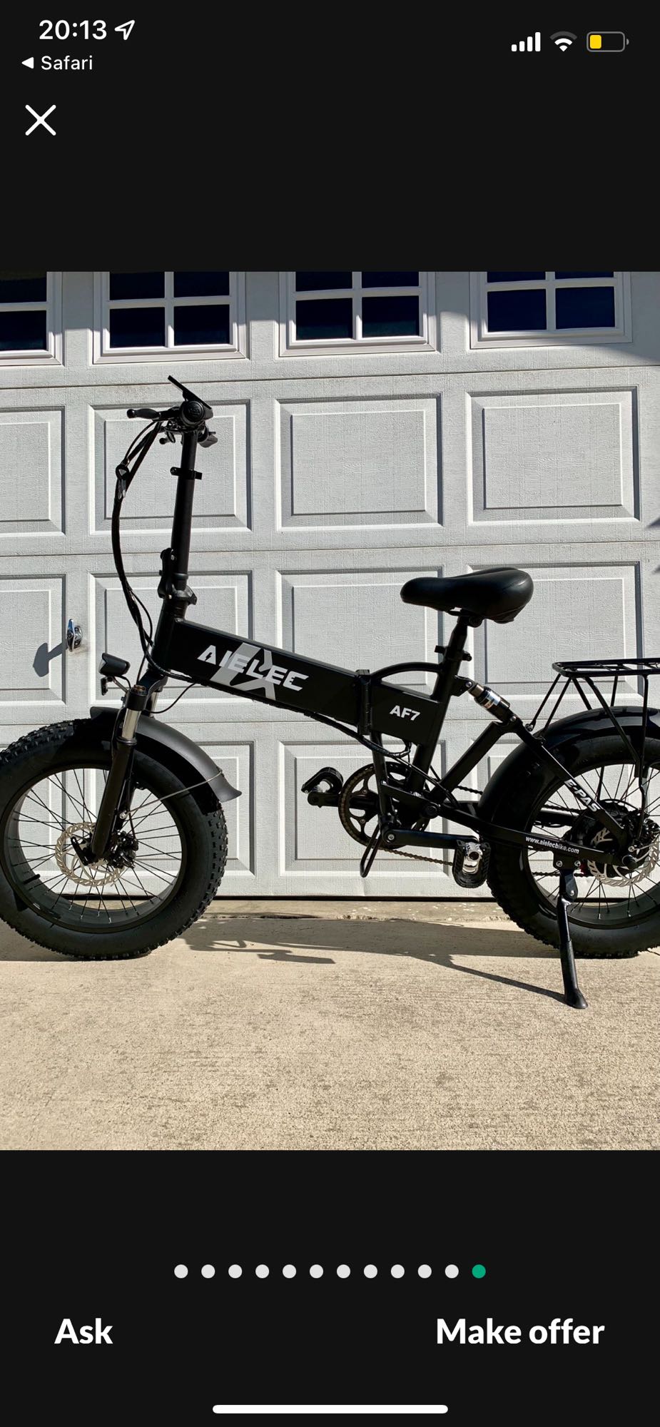 Black foldable AIEL EC AF7 electric fat tire bike, ideal for RV rental adventures or compact storage.