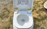 Dometic 972 portable toilet — new showers & toilets for sale