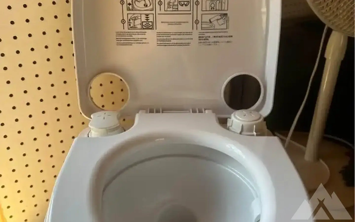 Dometic 972 Portable Toilet — new showers & toilets for sale
