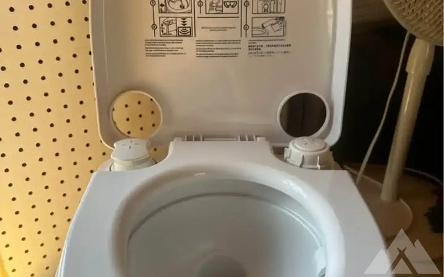 Dometic 972 Portable Toilet — new showers & toilets for sale