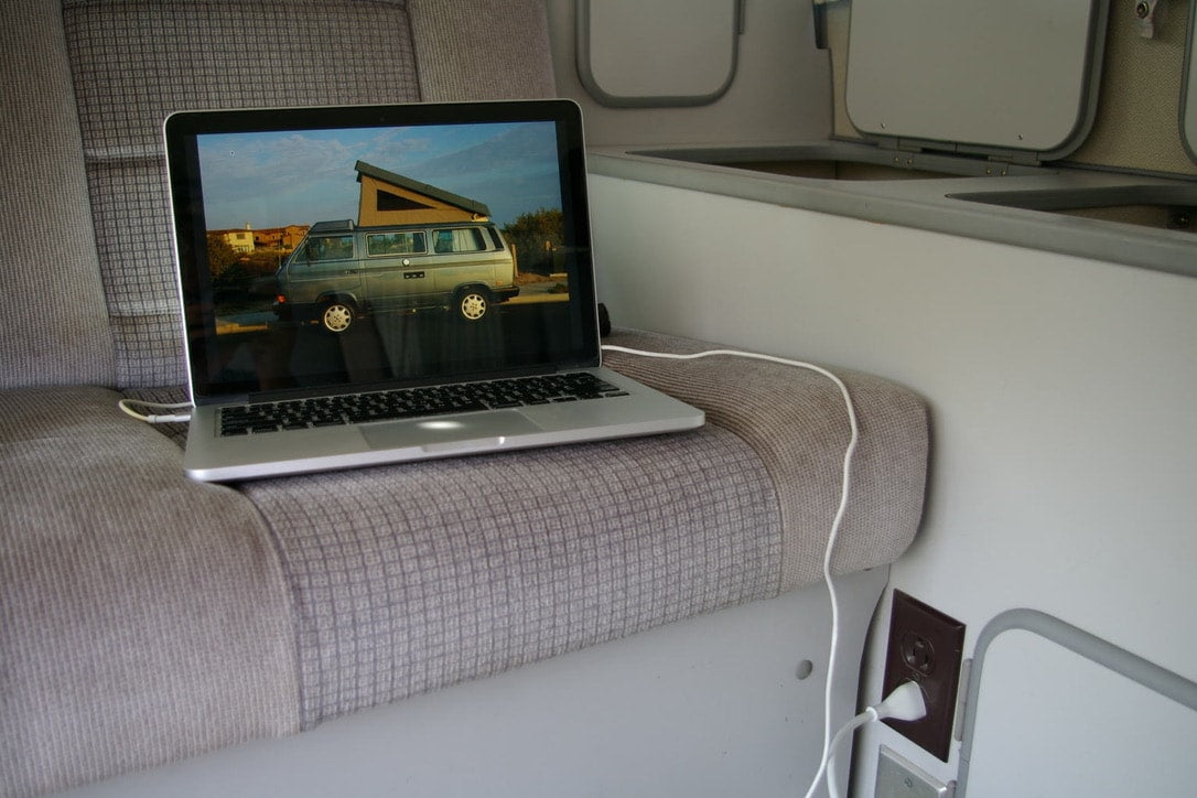  and manual shift. Road trip ready!|Blue pop-top camper van with open doors — photo 14