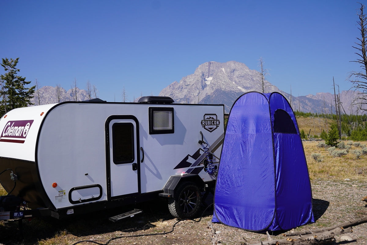  ideal for travel adventures.|RV rental: Gray upholstered bench seating with storage drawers — photo 9