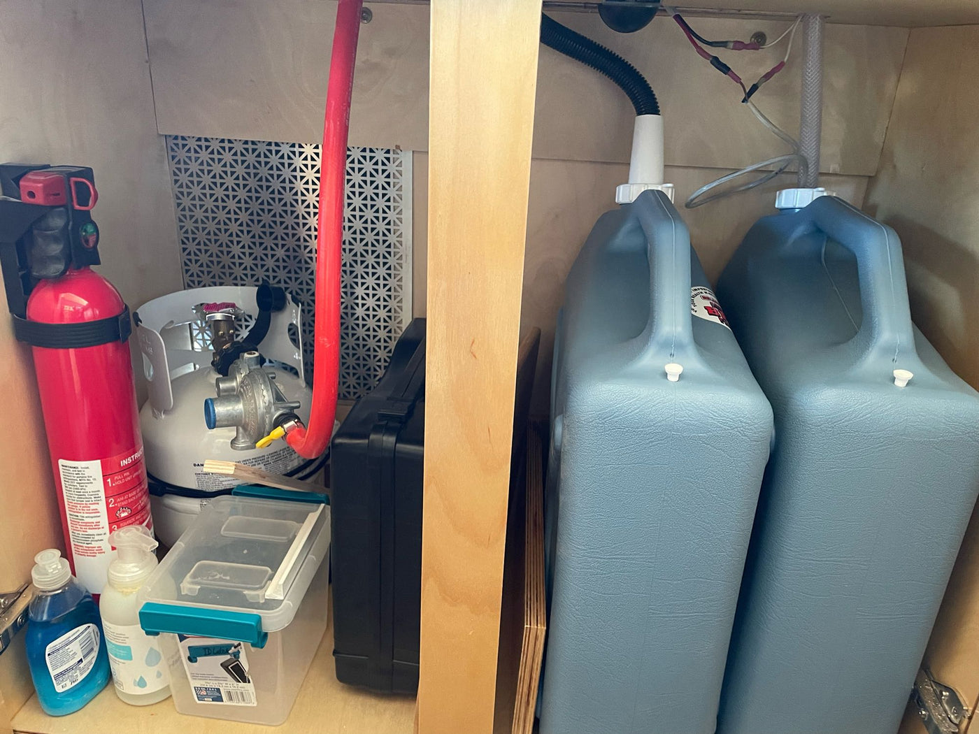  & window. Perfect for road trips.|This rv rental features a compact kitchen with a sink — photo 14