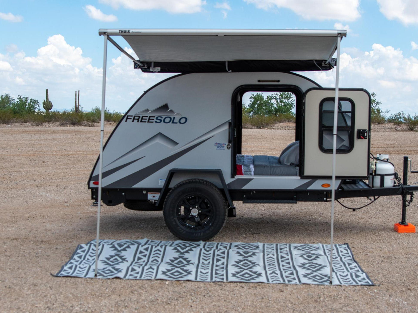  and a fire extinguisher.|Rent this FreeSolo teardrop RV rental for desert trips! Compact camper with extended awning — photo 3