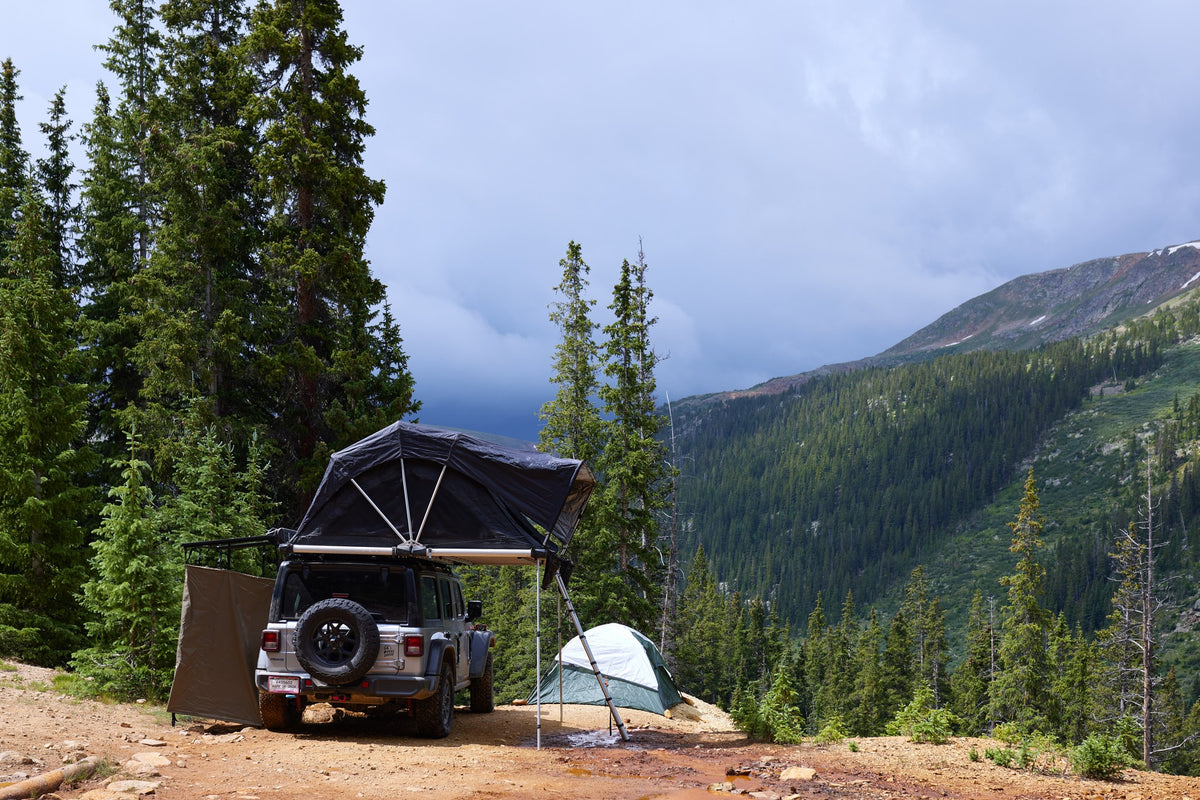 Overland camping setup with rooftop tent & ground tent