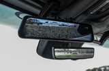 Dual rearview mirrors, including a digital display dash cam, inside an RV rental for enhanced visibility and safety.
