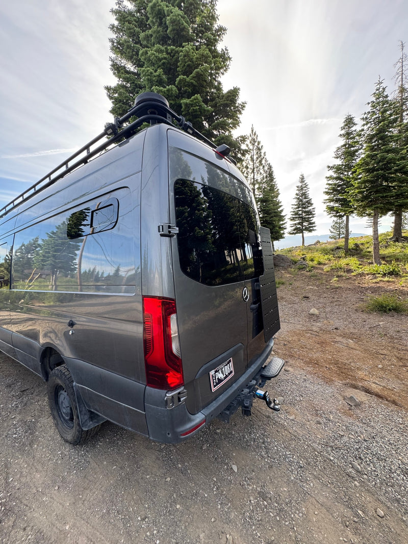  & Zamp solar charger display.|RV rental: A compact interior features a portable toilet under a seat cushion — photo 4