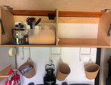  and a multi-spice shaker.|RV rental drawer featuring space-saving pots with lids