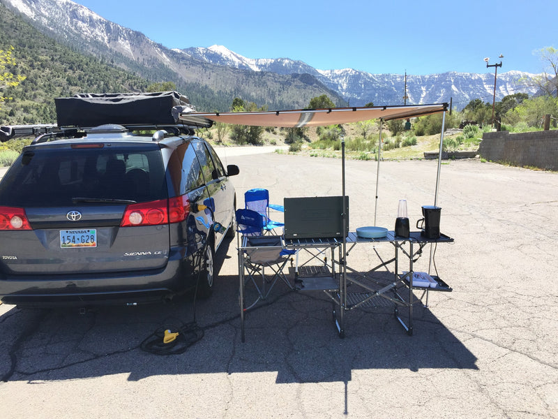  offering an RV rental experience in the mountains. Perfect for outdoor adventures.|A unique RV rental experience: a minivan with an attached screen room — photo 5