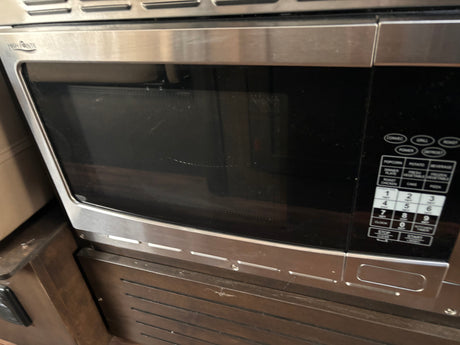 Compact stainless steel High Pointe microwave, ideal for an RV rental, featuring a convection oven and full control panel.