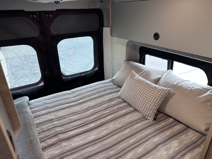  and flush cooktop.|Inside an RV rental: a compact wet bath with a toilet — photo 7