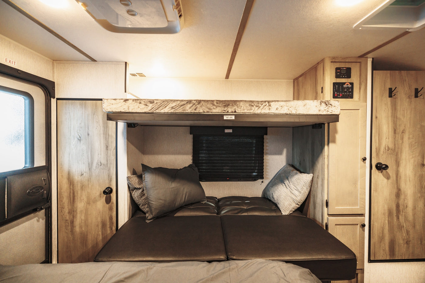 is adventure-ready.|This adventure-ready travel trailer is perfectly set up with dual awnings — photo 6