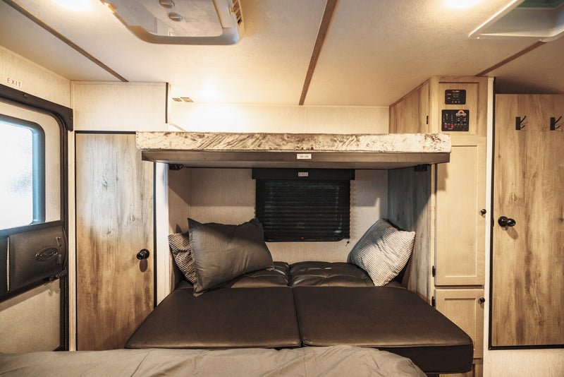  is adventure-ready.|This adventure-ready travel trailer is perfectly set up with dual awnings — photo 6