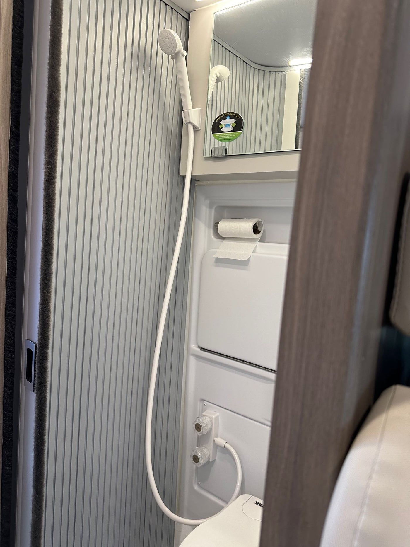  and front cockpit. Ready for travel!|Adventure awaits with this grey RV rental camper van — photo 3