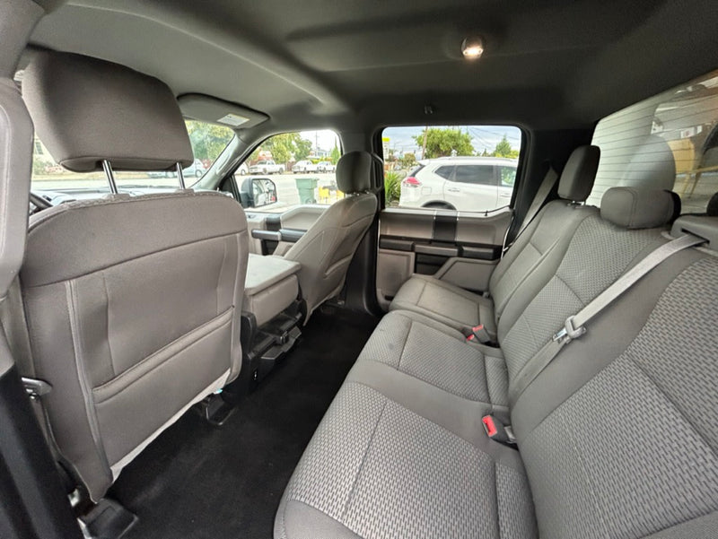  and fridge. Your mobile home for travel adventures.|Compact RV rental kitchen features microwave — photo 13
